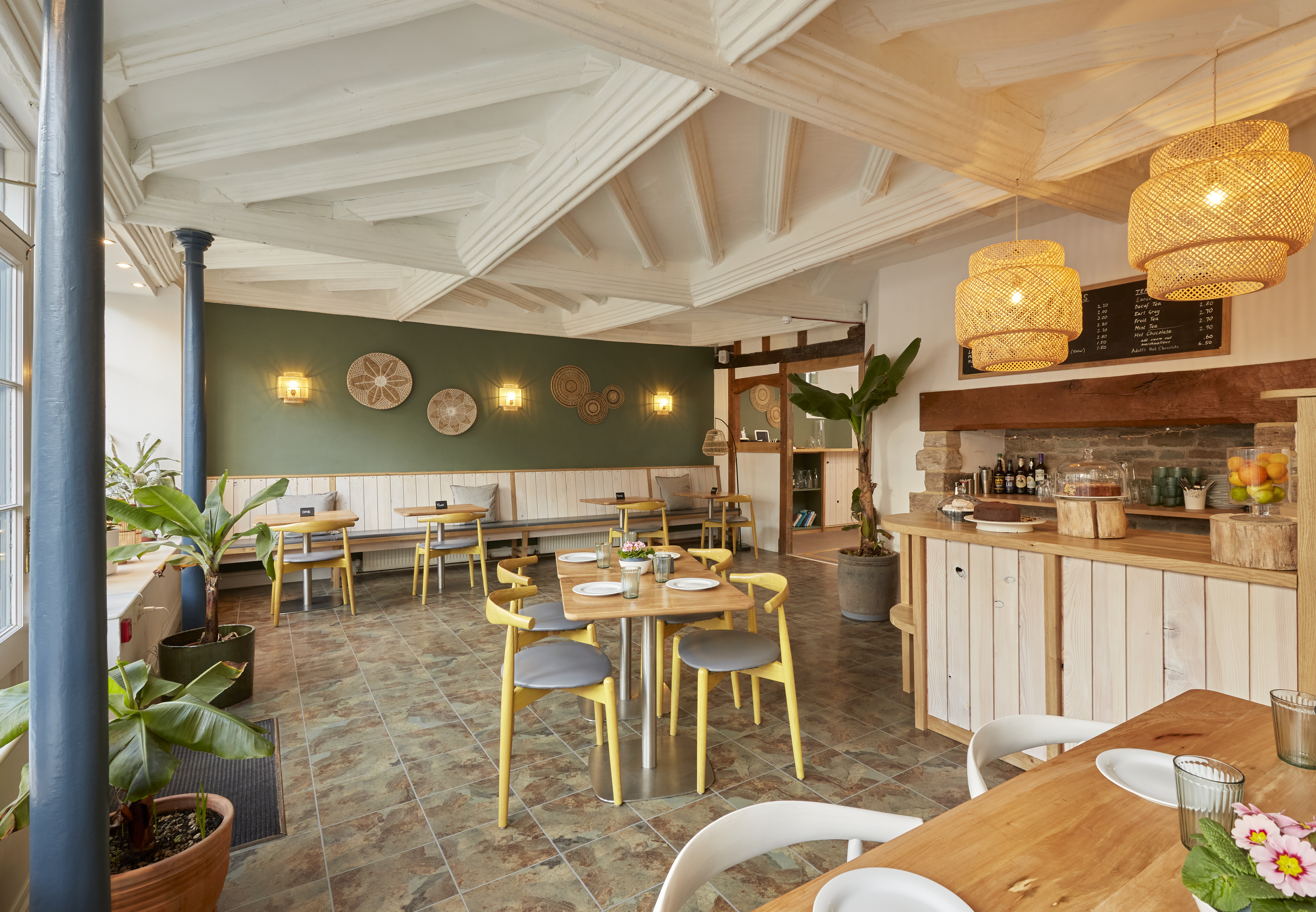 The front room of the cafe looking at the route back past the kitchen