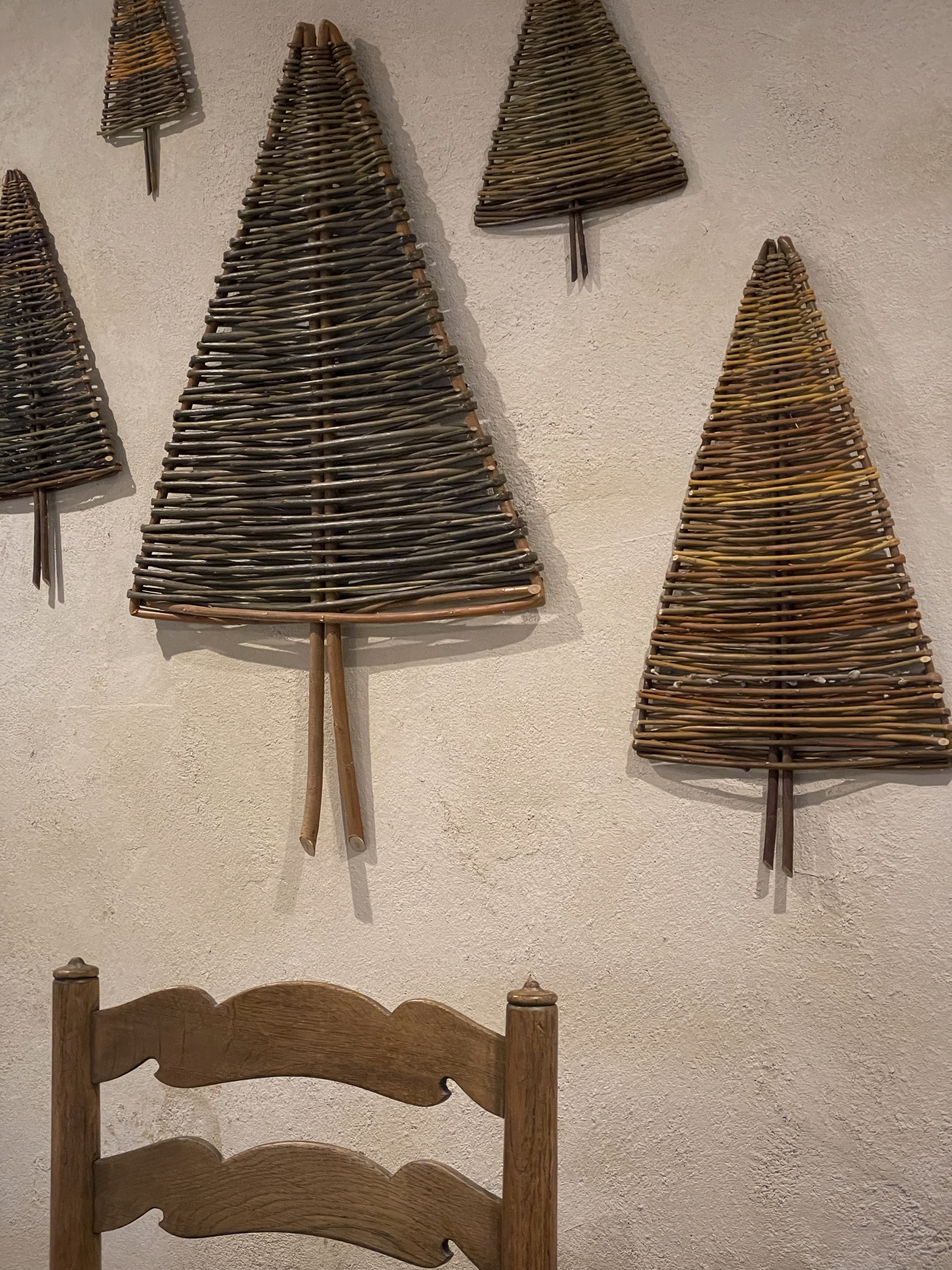 Wall decoration at the cafe - conifer trees